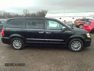 2015 Chrysler Town & Country Touring L with VIN 2C4RC1CG7FR539937, listed as a IAAI auction lot 41817807 with 158,400 mi miles and . Bid and sale history available at carsss.com. Image 13.