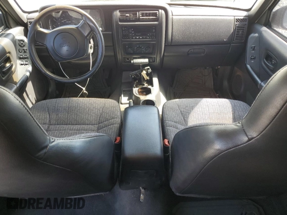 2000 Jeep Cherokee with VIN 1J4FT48S6YL152495, listed as a Copart auction lot 60627965 with 196,086 mi miles and Salvage title. Bid and sale history available at DreamBid. Image 8.