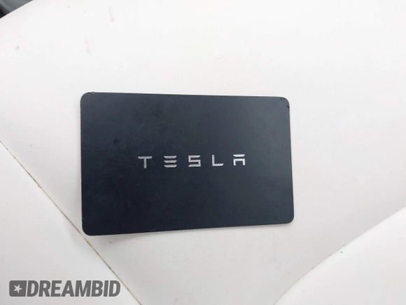 2023 Tesla Model Y Long Range with VIN 7SAYGDEE1PA169031, listed as a IAAI auction lot 41660766 with 35,253 mi miles and . Bid and sale history available at DreamBid. Image 11.