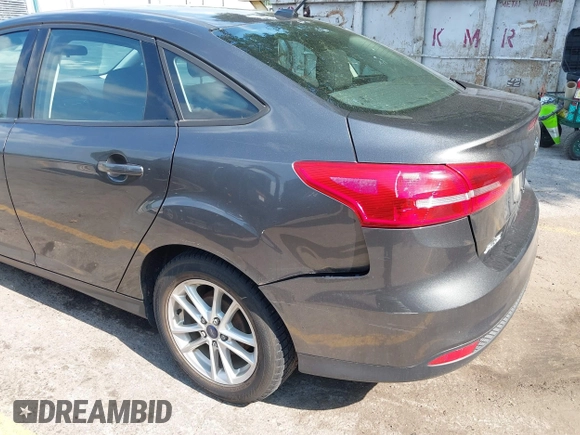 2016 Ford Focus SE with VIN 1FADP3F28GL270325, listed as a IAAI auction lot 42656953 with 120,833 mi miles and . Bid and sale history available at DreamBid. Image 16.