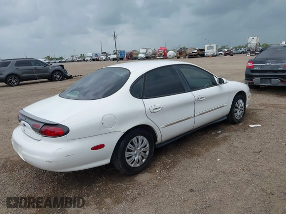 1998 Ford Taurus LX z VIN 1FAFP52U7WA146892, wystawiony jako IAAI lot #42313955 z przebiegiem 133 743 mil mil oraz . Historia ofert i sprzedaży dostępna na DreamBid. Obrazek 4.