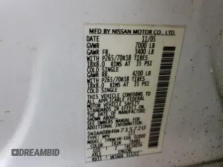 2006 Nissan Armada LE z VIN 5N1AA08B46N715720, wystawiony jako Copart lot #87299074 z przebiegiem 141 564 mil mil oraz Czysty tytuł • Clean title. Historia ofert i sprzedaży dostępna na DreamBid. Obrazek 13.