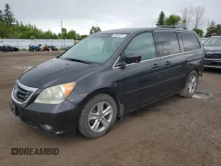 2009 Honda Odyssey Touring with VIN 5FNRL38809B503357, listed as a Copart auction lot 58035914 with 191,671 mi miles and Salvage Title. Bid and sale history available at carsss.com. Image 1.