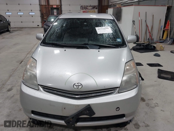 2007 Toyota Prius z VIN JTDKB20U977649489, wystawiony jako IAAI lot #41772600 z przebiegiem 248 525 mil mil oraz . Historia ofert i sprzedaży dostępna na DreamBid. Obrazek 12.
