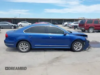 2017 Volkswagen Passat S z VIN 1VWAT7A34HC003813, wystawiony jako IAAI lot #42322928 z przebiegiem 207 115 mil mil oraz . Historia ofert i sprzedaży dostępna na DreamBid. Obrazek 14.