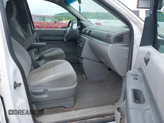 2005 Ford Freestar Cargo z VIN 2FTZA54655BA37485, wystawiony jako IAAI lot #42366467 z przebiegiem 260 249 mil mil oraz . Historia ofert i sprzedaży dostępna na DreamBid. Obrazek 5.