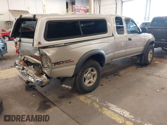 2003 Toyota Tacoma with VIN 5TEWN72N63Z262770, listed as a IAAI auction lot 41599128 with 329,377 mi miles. Bid and sale history available at carsss.com. Image 4.