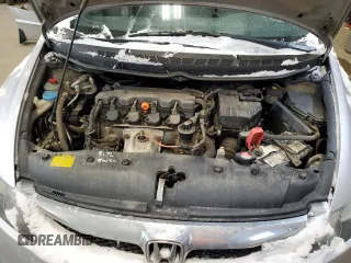 2010 Honda Civic z VIN 2HGFA1F23AH041808, wystawiony jako Copart lot #44968965 z przebiegiem 188 007 mil mil oraz Szkoda całkowita • Salvage title. Historia ofert i sprzedaży dostępna na DreamBid. Obrazek 11.