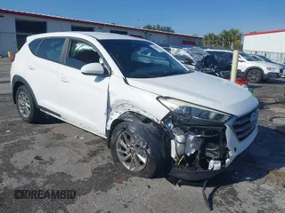 2018 Hyundai Tucson SE with VIN KM8J23A42JU627533, listed as a IAAI auction lot 41880112 with 61,840 mi miles. Bid and sale history available at carsss.com. Image 1.