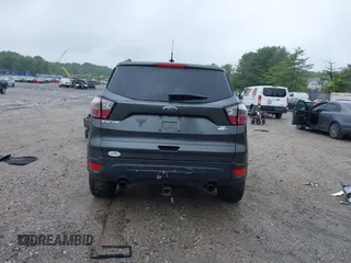 2017 Ford Escape SE z VIN 1FMCU9G95HUC83618, wystawiony jako IAAI lot #42324672 z przebiegiem 132 910 mil mil oraz . Historia ofert i sprzedaży dostępna na DreamBid. Obrazek 16.