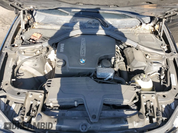 2015 BMW 3 Series 328i xDrive with VIN WBA3B3C59FJ985091, listed as a Copart auction lot 57658705 with 106,521 mi miles and Salvage title. Bid and sale history available at DreamBid. Image 11.