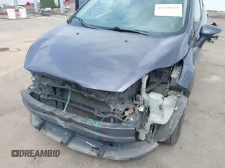 2013 Ford Fiesta SE z VIN 3FADP4BJ3DM186569, wystawiony jako IAAI lot #42128913 z przebiegiem 19 228 mil mil oraz . Historia ofert i sprzedaży dostępna na DreamBid. Obrazek 6.