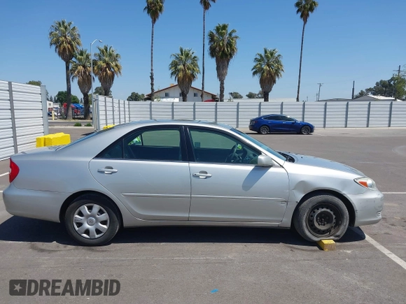 2004 Toyota Camry LE with VIN 4T1BE32K74U300025, listed as a IAAI auction lot 42035954 with 115,203 mi miles. Bid and sale history available at carsss.com. Image 13.