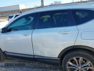 2020 Honda CR-V Touring with VIN 2HKRW2H91LH643923, listed as a IAAI auction lot 41258484 with 48,543 mi miles and . Bid and sale history available at DreamBid. Image 14.