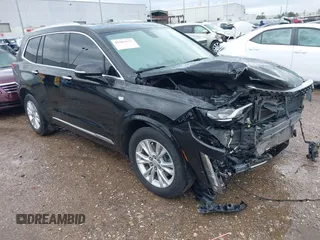 2023 Cadillac XT6 FWD Luxury with VIN 1GYKPAR44PZ114020, listed as a IAAI auction lot 41669115 with 110,305 mi miles. Bid and sale history available at carsss.com. Image 1.