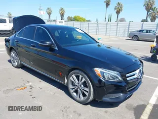 2018 Mercedes-Benz C with VIN 55SWF4JB9JU250869, listed as a IAAI auction lot 41990855 with 54,938 mi miles. Bid and sale history available at carsss.com. Image 1.