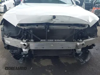 2018 Mercedes-Benz E 300 with VIN WDDZF4JB0JA371240, listed as a IAAI auction lot 42061937 with 66,167 mi miles and . Bid and sale history available at DreamBid. Image 6.