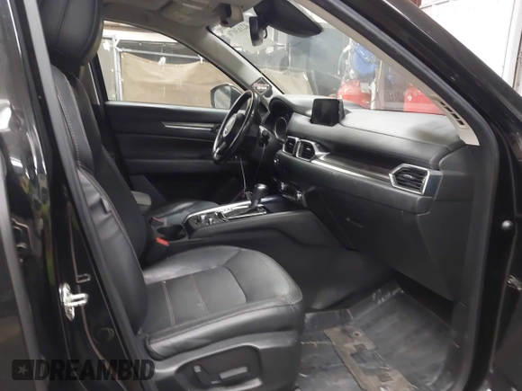 2018 Mazda CX-5 Grand Touring z VIN JM3KFADMXJ0311101, wystawiony jako IAAI lot #42163070 z przebiegiem 129 284 mil mil oraz . Historia ofert i sprzedaży dostępna na DreamBid. Obrazek 5.