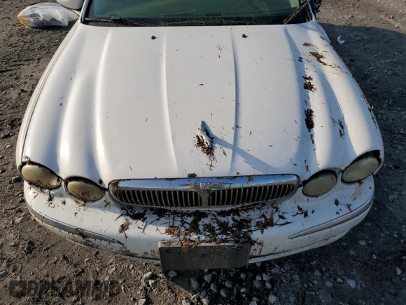 2005 Jaguar X-Type z VIN SAJWB52D55XE26531, wystawiony jako Copart lot #50909445 z przebiegiem 158 861 mil mil oraz Szkoda całkowita • Salvage title. Historia ofert i sprzedaży dostępna na DreamBid. Obrazek 11.