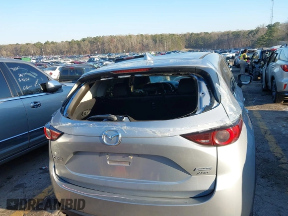 2018 Mazda CX-5 Touring with VIN JM3KFBCM6J0363767, listed as a IAAI auction lot 41776614 with 139,507 mi miles. Bid and sale history available at carsss.com. Image 20.