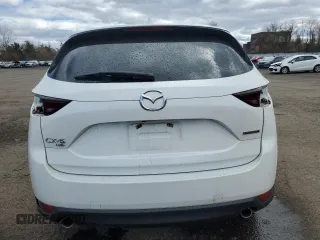 2020 Mazda CX-5 Touring with VIN JM3KFBCM8L0868020, listed as a Copart auction lot 53257795 with 74,189 mi miles and Salvage Title. Bid and sale history available at carsss.com. Image 6.