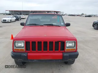 2001 Jeep Cherokee Sport with VIN 1J4FT48S01L537833, listed as a IAAI auction lot 41943255 with 239,473 mi miles. Bid and sale history available at carsss.com. Image 6.
