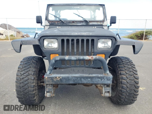 1990 Jeep Wrangler with VIN 2J4FY29T5LJ537896, listed as a Copart auction lot 57021295 with 143,753 mi miles and Clean title. Bid and sale history available at DreamBid. Image 5.