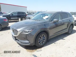 2021 Mazda CX-9 Touring with VIN JM3TCACY2M0502016, listed as a IAAI auction lot 41825456 with 86,068 mi miles. Bid and sale history available at carsss.com. Image 17.