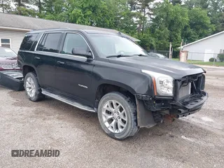 2015 GMC Yukon SLT z VIN 1GKS2BKC9FR115369, wystawiony jako IAAI lot #42439361 z przebiegiem 236 845 mil mil oraz . Historia ofert i sprzedaży dostępna na DreamBid. Obrazek 1.