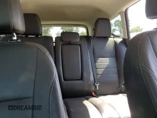 2015 Ford Escape Titanium with VIN 1FMCU0J97FUC80446, listed as a Copart auction lot 58749895 with 106,890 mi miles and Salvage title. Bid and sale history available at DreamBid. Image 10.