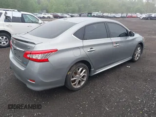 2013 Nissan Sentra SR z VIN 3N1AB7AP0DL766485, wystawiony jako IAAI lot #42188309 z przebiegiem 140 337 mil mil oraz . Historia ofert i sprzedaży dostępna na DreamBid. Obrazek 4.