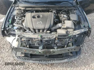 2020 Mazda 3 z VIN 3MZBPABL2LM130247, wystawiony jako Copart lot #58464105 z przebiegiem 54 571 mil mil oraz Szkoda całkowita • Salvage title. Historia ofert i sprzedaży dostępna na DreamBid. Obrazek 11.