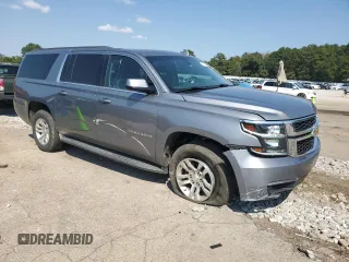 2018 Chevrolet Suburban LS with VIN 1GNSCGKC6JR354626, listed as a Copart auction lot 73721314 with 127,029 mi miles and Salvage title. Bid and sale history available at DreamBid. Image 4.