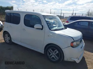 2009 Nissan Cube S z VIN JN8AZ28R59T104301, wystawiony jako IAAI lot #41905259 z przebiegiem 161 693 mil mil oraz . Historia ofert i sprzedaży dostępna na DreamBid. Obrazek 1.
