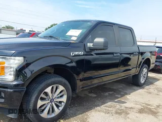 2018 Ford F-150 XL with VIN 1FTEW1EP1JKD05142, listed as a IAAI auction lot 42473177 with 99,079 mi miles and . Bid and sale history available at DreamBid. Image 15.