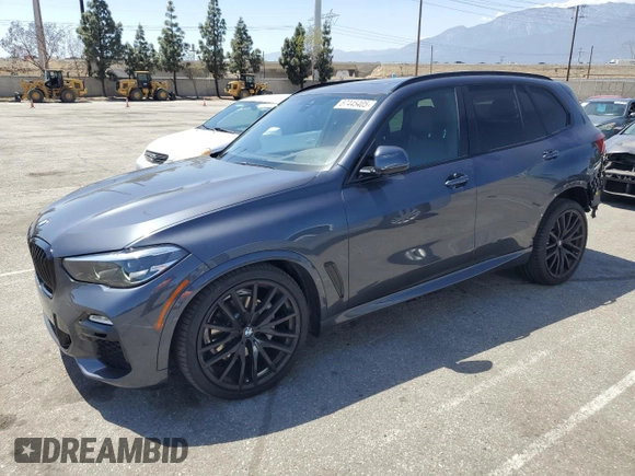 2021 BMW X5 xDrive40i with VIN 5UXCR6C06M9H65380, listed as a Copart auction lot 57445405 with 33,916 mi miles and Salvage title. Bid and sale history available at DreamBid. Image 1.