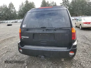 2003 GMC Envoy XL SLT with VIN 1GKES16S036191987, listed as a Copart auction lot 76776604 with 253,889 mi miles and Salvage Title. Bid and sale history available at carsss.com. Image 6.