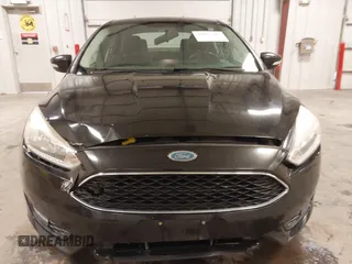 2015 Ford Focus SE with VIN 1FADP3F24FL255450, listed as a IAAI auction lot 41673301 with 103,650 mi miles. Bid and sale history available at carsss.com. Image 12.