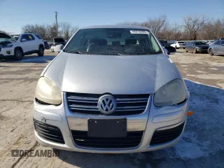 2007 Volkswagen Jetta z VIN 3VWHG71K27M111595, wystawiony jako Copart lot #42016995 z przebiegiem 155 565 mil mil oraz Czysty tytuł • Clean title. Historia ofert i sprzedaży dostępna na DreamBid. Obrazek 5.