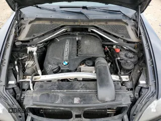 2012 BMW X5 35i with VIN 5UXZV4C50CL989832, listed as a Copart auction lot 62606485 with 157,025 mi miles and Clean title. Bid and sale history available at DreamBid. Image 12.
