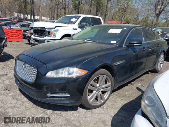 2013 Jaguar XJ Portfolio z VIN SAJWJ2GD0D8V49329, wystawiony jako IAAI lot #41829426 z przebiegiem 125 584 mil mil oraz . Historia ofert i sprzedaży dostępna na DreamBid. Obrazek 2.