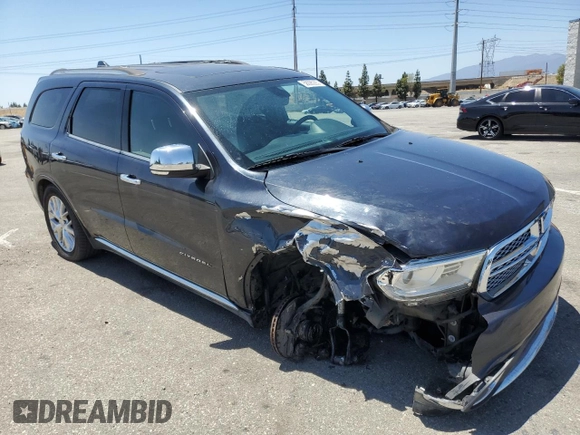 2014 Dodge Durango Citadel with VIN 1C4SDJET1EC594240, listed as a Copart auction lot 58090285 with 160,027 mi miles and Salvage title. Bid and sale history available at DreamBid. Image 4.