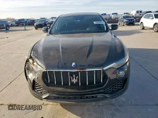 2018 Maserati Levante z VIN ZN661XUA1JX279016, wystawiony jako Copart lot #49554915 z przebiegiem 57 896 mil mil oraz Szkody całkowita. Historia ofert i sprzedaży dostępna na DreamBid. Obrazek 5.