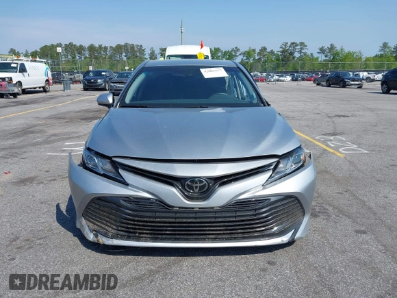 2020 Toyota Camry LE with VIN 4T1C11AK9LU341762, listed as a IAAI auction lot 42001577 with 84,991 mi miles and . Bid and sale history available at DreamBid. Image 12.