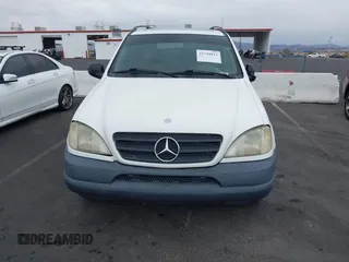 1998 Mercedes-Benz M-Class with VIN 4JGAB54E8WA033005, listed as a IAAI auction lot 41749012 with 194,731 mi miles. Bid and sale history available at carsss.com. Image 6.