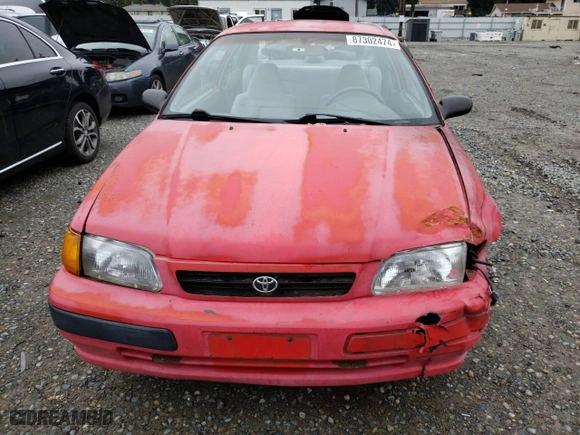 1995 Toyota Tercel DX with VIN JT2EL56D8S0069454, listed as a Copart auction lot 87302474 with 163,572 mi miles and Salvage Title. Bid and sale history available at carsss.com. Image 5.