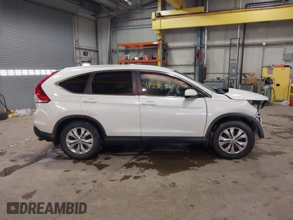 2014 Honda CR-V EX-L with VIN 5J6RM3H72EL012391, listed as a IAAI auction lot 41596897 with 99,000 mi miles and . Bid and sale history available at carsss.com. Image 14.