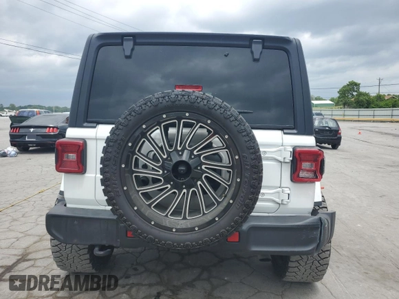 2022 Jeep Wrangler Unlimited Sahara с VIN 1C4HJXEN0NW262439, выставлен на аукционе Copart как лот 57469545 с пробегом 30 336 миль миль и Списание • Salvage title. История ставок и продаж доступна на DreamBid. Изображение 6.