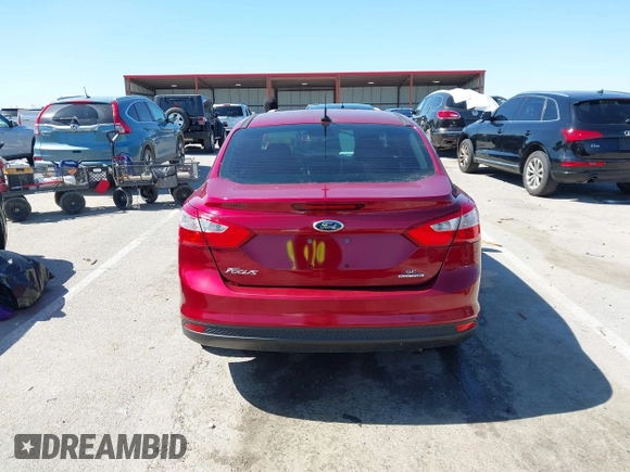 2013 Ford Focus SE with VIN 1FADP3F21DL241017, listed as a IAAI auction lot 41825092 with 101,833 mi miles and . Bid and sale history available at DreamBid. Image 16.