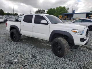 2021 Toyota Tacoma SR с VIN 3TMCZ5AN4MM386662, выставлен на аукционе Copart как лот 56954865 с пробегом 70 623 миль миль и Списание • Salvage title. История ставок и продаж доступна на DreamBid. Изображение 4.